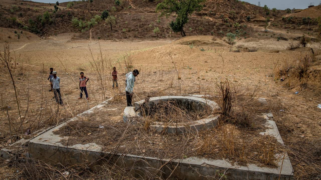 A dry well that ran out of water two years before, in Parshoi, Uttar Pradesh, India, June 14, 2019. By Bryan Denton c.2019 The New York Times