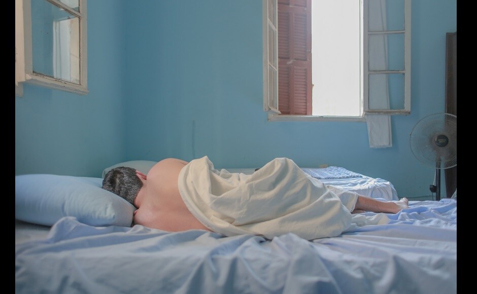 Photograph by Augustine Parades. In the picture: A boy sleeping in Hostel Beirut. Parades says, "It was 9.24 am; the sun finally awoke from a long night of resting while the moon watched over the city of Beirut, its lovers and its ruins. I packed my bags as I prepared to fly back home and this is what I was saying goodbye to - a boy, sleeping in Hostel Beirut." (This photo is part of Parades' project, Long Night Stands With Lonely, Lonely Boys) Photograph by Augustine Parades. In the picture: A boy sleeping in Hostel Beirut. Parades says, "It was 9.24 am; the sun finally awoke from a long night of resting while the moon watched over the city of Beirut, its lovers and its ruins. I packed my bags as I prepared to fly back home and this is what I was saying goodbye to - a boy, sleeping in Hostel Beirut." (This photo is part of Parades' project, Long Night Stands With Lonely, Lonely Boys)