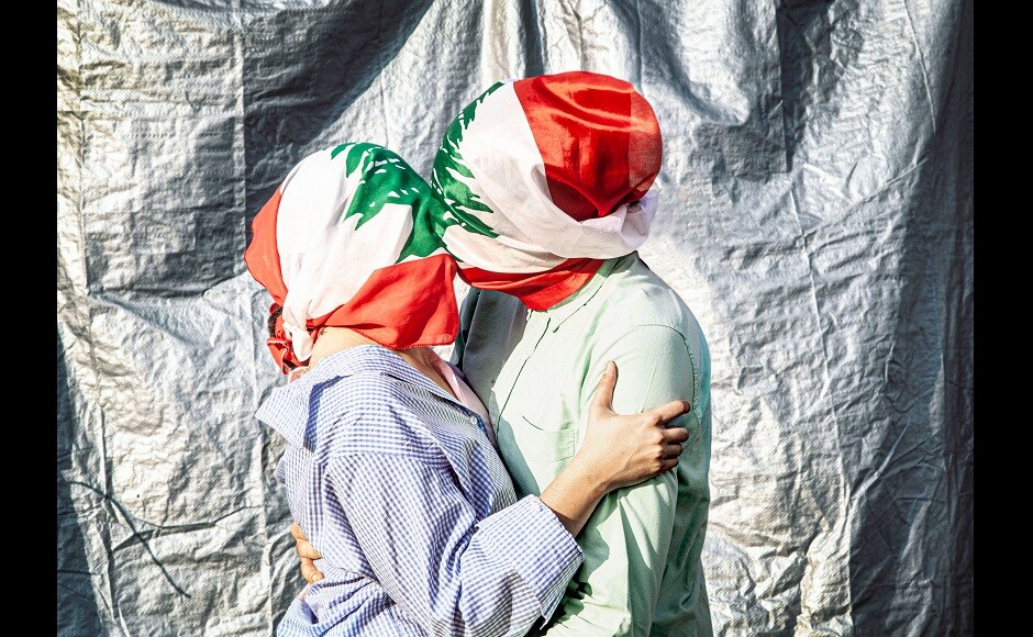 Printed on archival fine art paper, they will be open editions sized at 10x15” (25x38 cms) at US$ 135 + shipping, and will be dispatched globally from Gulf Photo Plus in Dubai | Photograph by Omar Sfeir. In the picture: As Sfeir photographed Lebanons October Revolution and captured its surreal moments, he was reminded of the work of French surrealist artist, artist Rene Magritte. His work pays homage to Magritte’s painting, 'The Lovers,' but with a distinctly Lebanese feel. Printed on archival fine art paper, they will be open editions sized at 10x15” (25x38 cms) at US$ 135 + shipping, and will be dispatched globally from Gulf Photo Plus in Dubai | Photograph by Omar Sfeir. In the picture: As Sfeir photographed Lebanons October Revolution and captured its surreal moments, he was reminded of the work of French surrealist artist, artist Rene Magritte. His work pays homage to Magritte’s painting, 'The Lovers,' but with a distinctly Lebanese feel.