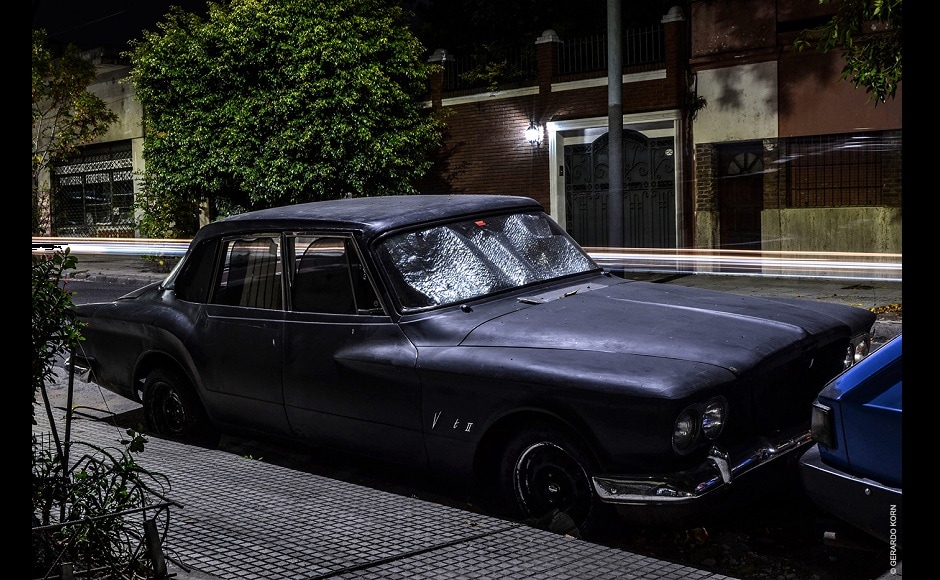 It might be worth mentioning that all the vehicles documented in Korn's project were manufactured in Argentina, a country that has always had an important automotive industry. | In the picture: Valiant, Villa Urquiza neighbourhood, 2019. There are almost no cars left on the streets of this model, a Valiant from the early '60s which would definitely look good in a Batman movie. For Korn, it generates a certain nostalgia in him, since it was the first car his parents had and it's the first car he has any memory of. This car was parked on a busy street with a lot of traffic, so it was impossible not to see some of it in the picture, hence the light trail. It might be worth mentioning that all the vehicles documented in Korn's project were manufactured in Argentina, a country that has always had an important automotive industry. | In the picture: Valiant, Villa Urquiza neighbourhood, 2019. There are almost no cars left on the streets of this model, a Valiant from the early '60s which would definitely look good in a Batman movie. For Korn, it generates a certain nostalgia in him, since it was the first car his parents had and it's the first car he has any memory of. This car was parked on a busy street with a lot of traffic, so it was impossible not to see some of it in the picture, hence the light trail.