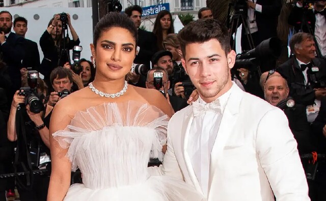 Out of all their red carpet appearances, the one event that cemented their status as the most stylish duo in business was Cannes 2019. On the third day of the fest, Nick and Priyanka made their first appearance together on the red carpet, sporting all-white ensembles. While Priyanka opted for an ivory tulle dress from Georges Hobeika, Nick sported a crisp white suit with a pearly white bowtie. Out of all their red carpet appearances, the one event that cemented their status as the most stylish duo in business was Cannes 2019. On the third day of the fest, Nick and Priyanka made their first appearance together on the red carpet, sporting all-white ensembles. While Priyanka opted for an ivory tulle dress from Georges Hobeika, Nick sported a crisp white suit with a pearly white bowtie.