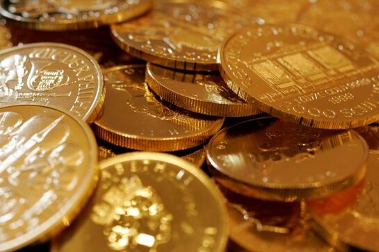Gold slips as risk-on sentiment weighs, trade deal in focus Gold slips as risk-on sentiment weighs, trade deal in focus