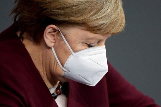 Germany introduces tougher restrictions in pandemic battle Germany introduces tougher restrictions in pandemic battle