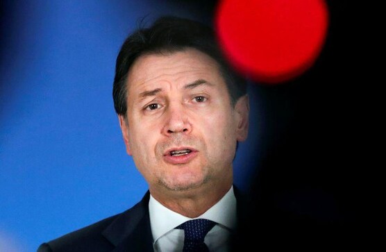 Italy PM wins backing for deficit hike after surviving coalition ambush Italy PM wins backing for deficit hike after surviving coalition ambush