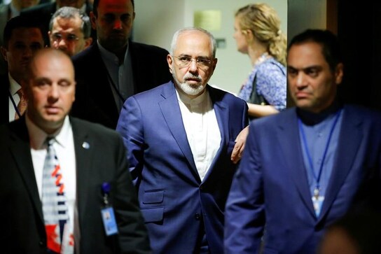 Iran's Rouhani stands by moderate ally Zarif after surprise resignation Iran's Rouhani stands by moderate ally Zarif after surprise resignation