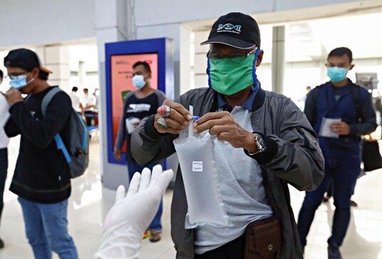 Indonesia deploys coronavirus breathalyzer at train stations Indonesia deploys coronavirus breathalyzer at train stations