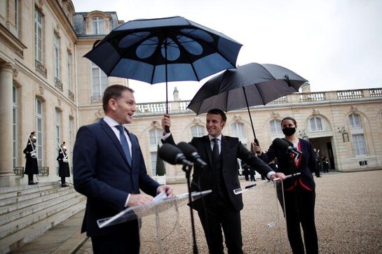 France's Macron: I will not surrender my umbrella France's Macron: I will not surrender my umbrella