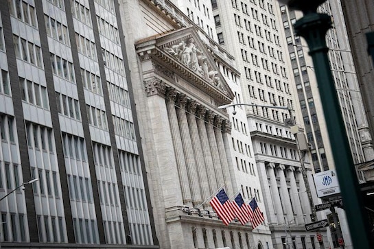 Wall Street mixed as Apple and Tesla retreat