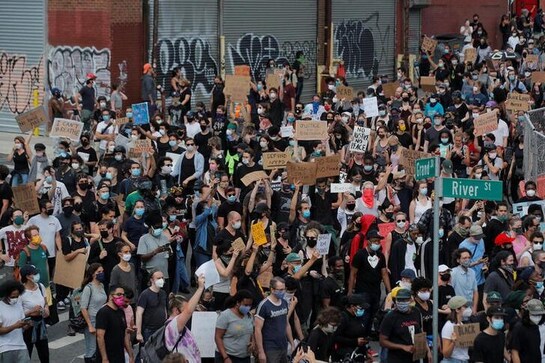 Protesters should 'highly consider' getting COVID-19 tests, U.S. official says Protesters should 'highly consider' getting COVID-19 tests, U.S. official says