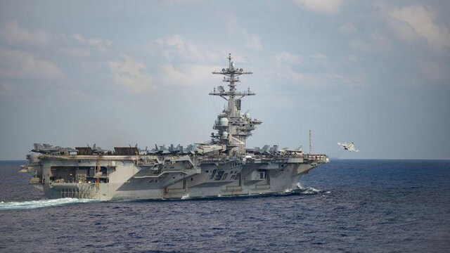U.S. ship back at sea after virus outbreak and captain fired U.S. ship back at sea after virus outbreak and captain fired