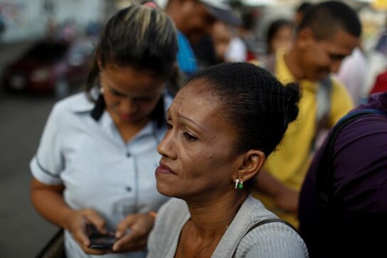 Weary Venezuelans rely on 'dog cart' transports as buses succumb to crisis Weary Venezuelans rely on 'dog cart' transports as buses succumb to crisis