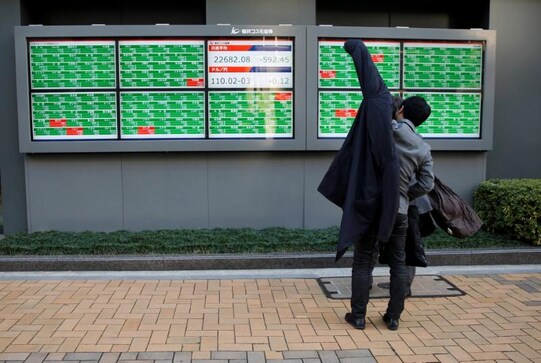 Japan shares jump as yen bows to strong dollar Japan shares jump as yen bows to strong dollar