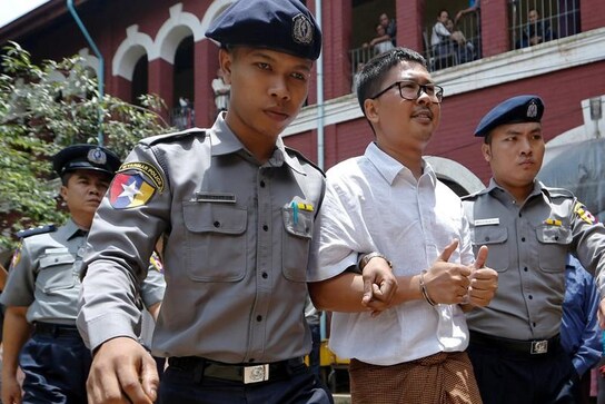 Black hoods, kneeling, no sleep: Reuters reporter details Myanmar custody Black hoods, kneeling, no sleep: Reuters reporter details Myanmar custody
