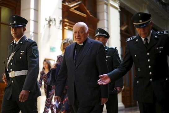 Chile names Santiago archbishop as suspect in sex abuse cover-up Chile names Santiago archbishop as suspect in sex abuse cover-up