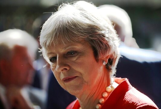 A break from Brexit: UK PM May to holiday in Italy, Switzerland A break from Brexit: UK PM May to holiday in Italy, Switzerland