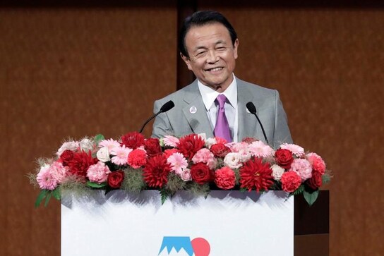 Japan's top government spokesman Suga, finance minister Aso to retain posts - Kyodo Japan's top government spokesman Suga, finance minister Aso to retain posts - Kyodo