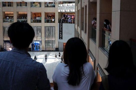 Hong Kong marks handover anniversary as national security law takes effect