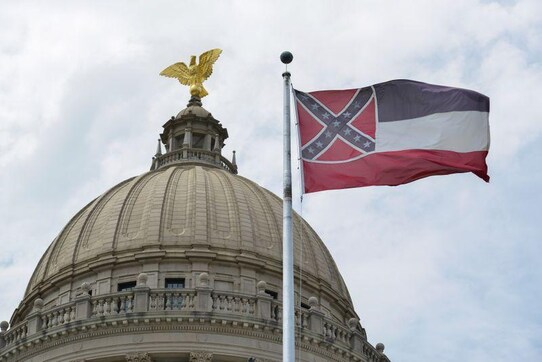 Mississippi governor signs bill removing state flag with Confederate emblem Mississippi governor signs bill removing state flag with Confederate emblem