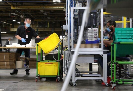 U.S. manufacturing activity near 1-1/2-year high, factory job losses persist U.S. manufacturing activity near 1-1/2-year high, factory job losses persist