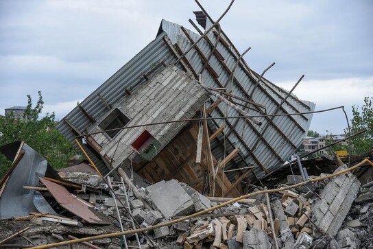 Death toll rises as Azeris, Armenians say civilian areas are under fire