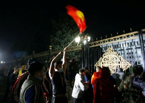 Kyrgyzstan on edge of chaos after opposition storms government buildings
