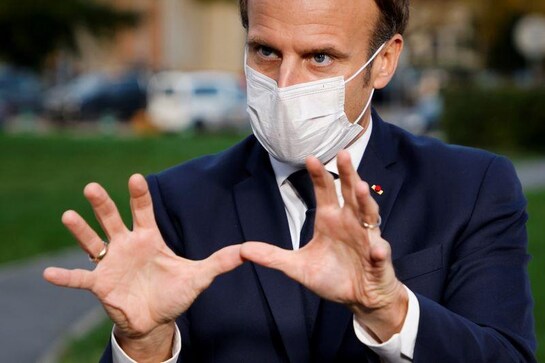 France's Macron: Expect to live with virus at least till mid-2021 France's Macron: Expect to live with virus at least till mid-2021