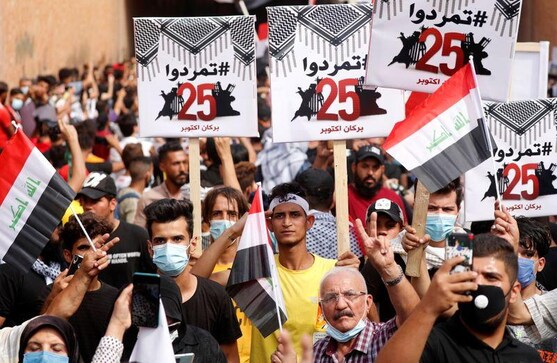 Iraqi forces, protesters clash in Baghdad, injuries on both sides Iraqi forces, protesters clash in Baghdad, injuries on both sides