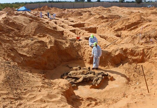 Libyan investigators find more mass graves in recaptured city Libyan investigators find more mass graves in recaptured city