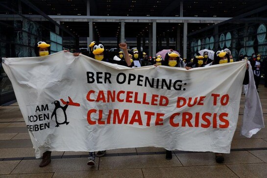 Climate activists disrupt opening of new Berlin airport Climate activists disrupt opening of new Berlin airport