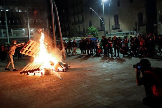 Protesters against COVID-19 restrictions clash with police in Spanish cities Protesters against COVID-19 restrictions clash with police in Spanish cities