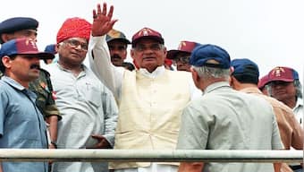 File image of Prime Minister Atal Behari Vajpayee waving to cameramen as he stands on the edge of the crater at the Shakti-1 site, where an underground nuclear test took place on 11 May.  AFP
