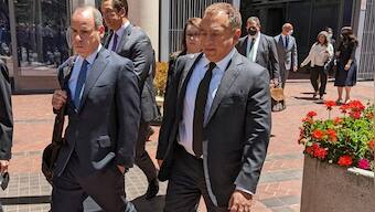 Ramesh 'Sunny' Balwani, right, the former business partner of Theranos CEO Elizabeth Holmes, leaves a San Jose, Calif., federal courthouse with his lawyers, after a jury convicted him on 12 counts of duping investors and patients while running a blood-testing startup that was once a Silicon Valley sensation before being exposed as a sham. AP 