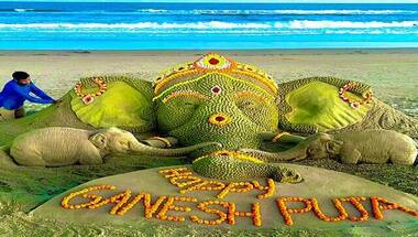 Sand artist Sudarsan Pattnaik creates Lord Ganesha sculpture out of over 3,000 sand laddoos