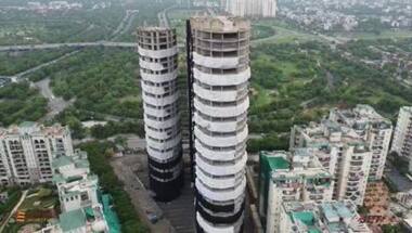 How strong an earthquake will Noida twin towers cause when they come down?