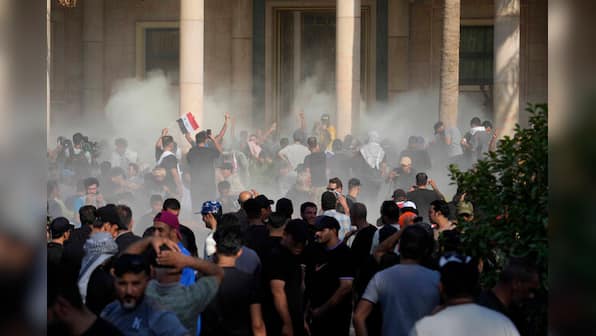 Iraq: Supporters of powerful cleric Moqtada Sadr end protests as clashes claim 30 lives