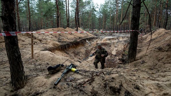 Ukraine: Mass grave with over 440 bodies found in recaptured Izium