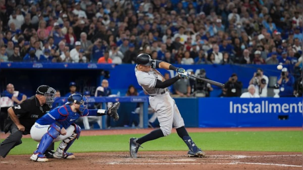 Aaron Judge of the New York Yankees blasts 61st home run of the season to equal Roger Maris' record