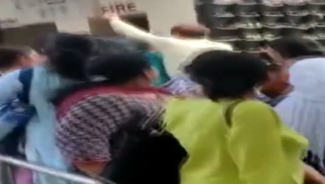 Caught on camera: School teacher beats up security guard; matter under inquiry Caught on camera: School teacher beats up security guard; matter under inquiry