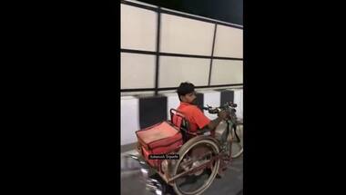 Watch: Specially-abled Zomato delivery agent delivers food on motorised wheelchair, internet hails him