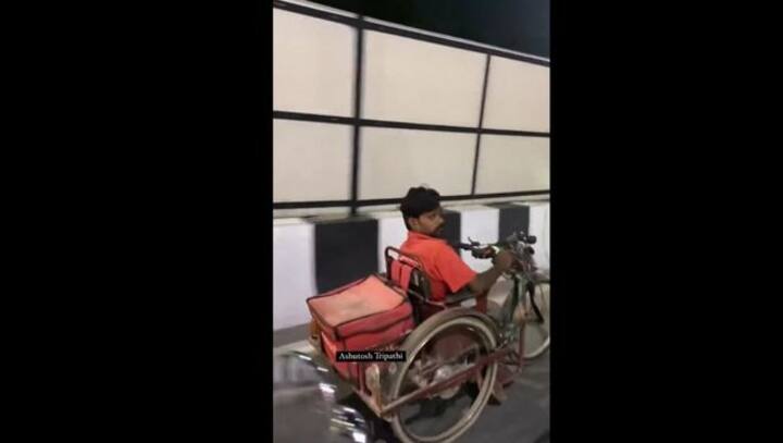 Watch: Specially-abled Zomato delivery agent delivers food on motorised wheelchair, internet hails him