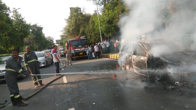 Watch: SUV charred at Noida Link road; no casualty Watch: SUV charred at Noida Link road; no casualty
