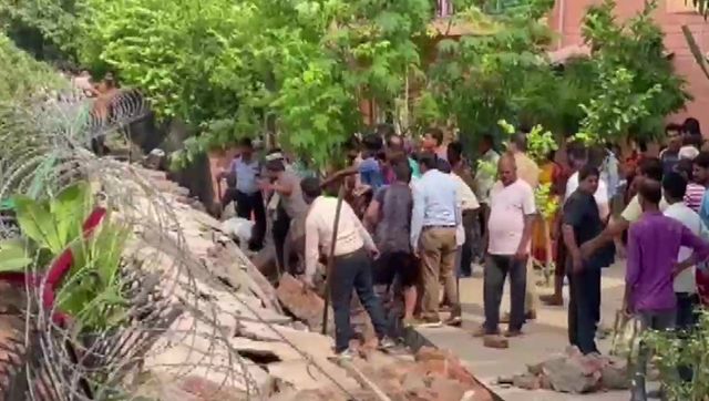 Noida: 4 dead, several trapped as boundary wall of residential society in Sector 21 collapses Noida: 4 dead, several trapped as boundary wall of residential society in Sector 21 collapses