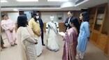Watch: Robot dressed in saree accepts loan document from bank branch