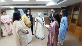 Watch: Robot dressed in saree accepts loan document from bank branch