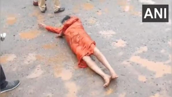 Watch: Social worker rolls on stretch of road to protest against potholes