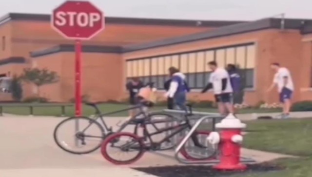 Girl with down syndrome welcomed with high-fives by school seniors, video wins hearts Girl with down syndrome welcomed with high-fives by school seniors, video wins hearts