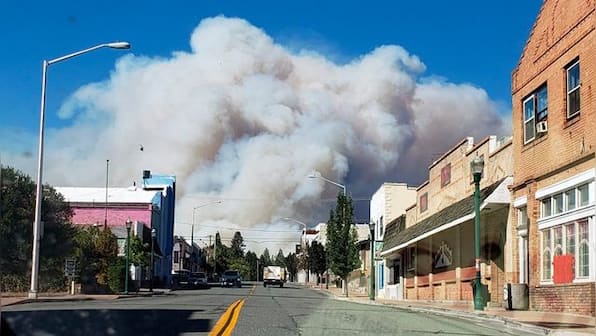 Fast moving Northern California wildfire destroys multiple homes, forces residents to flee