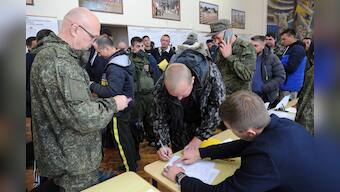 Man shoots Russian officer at military draft centre as Kremlin admits 'errors' in partial mobilisation announcement