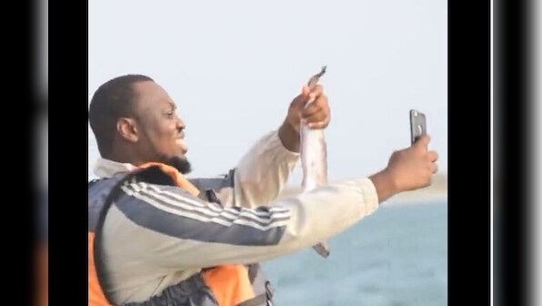 Video of man flinging his phone in water instead of fish goes viral