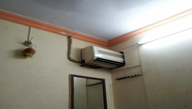 Hotel's jugaad of splitting split AC in between two rooms goes viral Hotel's jugaad of splitting split AC in between two rooms goes viral